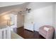 Bright Bedroom featuring white furniture, ceiling fan, and hardwood floors at 1841 Datura St, Sarasota, FL 34239