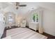 Light-filled bedroom with window seat and charming decor at 1841 Datura St, Sarasota, FL 34239