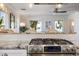 Elegant kitchen featuring a modern stainless steel range and view into the living area, creating an open feel at 1841 Datura St, Sarasota, FL 34239