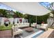 Outdoor patio featuring cushioned seating and manicured landscaping at 1841 Datura St, Sarasota, FL 34239