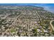 Expansive aerial view of a well-planned community featuring tree-lined streets and lovely landscaping at 1904 Nw 79Th St, Bradenton, FL 34209