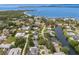 Scenic aerial view of waterfront homes and community with mature trees and water access at 1904 Nw 79Th St, Bradenton, FL 34209