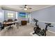 Spacious multipurpose room with a fan, TV, desk, and workout bikes, perfect for a home office or gym at 1904 Nw 79Th St, Bradenton, FL 34209