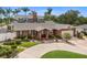 Attractive brick home with an attached two-car garage, well-kept lawn, and ample landscaping at 1904 Nw 79Th St, Bradenton, FL 34209