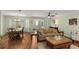 Bright living room with large windows, tile floors, and dining area at 1904 Nw 79Th St, Bradenton, FL 34209