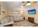 Relaxing living room with neutral furniture and a mounted television at 1904 Nw 79Th St, Bradenton, FL 34209