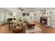 Spacious living room with a fireplace, tile floors, and comfortable seating at 1904 Nw 79Th St, Bradenton, FL 34209