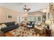 Open living room featuring tile flooring, lots of natural light, and access to the pool at 1904 Nw 79Th St, Bradenton, FL 34209
