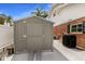 Backyard storage shed offers additional space for tools and equipment, complementing the property's organization at 1904 Nw 79Th St, Bradenton, FL 34209