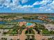 An aerial view of the community showcasing lakes, parks, and beautiful landscaping on a sunny day at 20542 Trattoria Loop, Venice, FL 34293