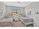 Comfortable twin bedroom with warm neutral decor at 20542 Trattoria Loop, Venice, FL 34293