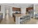Spacious kitchen with granite counters, stainless steel appliances, and ample cabinet space at 20542 Trattoria Loop, Venice, FL 34293