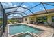 Inviting outdoor pool and patio area perfect for relaxation and entertaining guests at 20542 Trattoria Loop, Venice, FL 34293