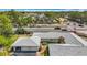Aerial view featuring a meticulously maintained home with mature trees and landscaping at 2188 Corinne S Ct # A, St Petersburg, FL 33712