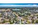 Beautiful aerial view of community featuring a neighborhood with lakes and lush landscaping at 2188 Corinne S Ct # A, St Petersburg, FL 33712