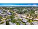 Aerial view showing the serene community with lush trees and well-maintained landscapes at 2188 Corinne S Ct # A, St Petersburg, FL 33712