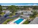 Aerial view featuring private pool and landscaping and long driveway at 2188 Corinne S Ct # A, St Petersburg, FL 33712