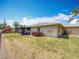 A view of the home's backyard, showcasing the building's exterior and garden at 2188 Corinne S Ct # A, St Petersburg, FL 33712
