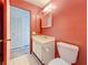 Bathroom view featuring a toilet, sink, vanity, mirror, and closet at 2188 Corinne S Ct # A, St Petersburg, FL 33712