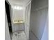 Bathroom featuring vanity, mirror, and closet, with adjacent toilet and shower at 2188 Corinne S Ct # A, St Petersburg, FL 33712