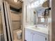 Bathroom features single sink vanity, medicine cabinet, toilet and a shower and tub combo at 2188 Corinne S Ct # A, St Petersburg, FL 33712