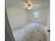 This bedroom has a ceiling fan, window and neutral paint at 2188 Corinne S Ct # A, St Petersburg, FL 33712