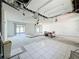 Spacious living room being renovated, with sliding doors to backyard patio at 2188 Corinne S Ct # A, St Petersburg, FL 33712