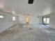 Bright living room with sliding glass door access to the lanai at 2188 Corinne S Ct # A, St Petersburg, FL 33712