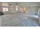 Open living room features a ceiling fan and access to additional rooms at 2188 Corinne S Ct # A, St Petersburg, FL 33712
