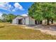 White barn with sliding doors and ample space, suitable for various agricultural or storage needs at 22803 67Th E Ave, Bradenton, FL 34211