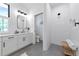 This is a remodeled bathroom that features a shower, large vanity, and open space at 22803 67Th E Ave, Bradenton, FL 34211