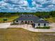 Lovely home with a sprawling lawn and beautiful landscaping, offering great curb appeal at 22803 67Th E Ave, Bradenton, FL 34211