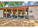Well-maintained horse barn featuring open stalls and a wooden structure, ideal for equestrian enthusiasts and livestock at 22803 67Th E Ave, Bradenton, FL 34211