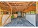 Spacious horse barn with wooden structure, and stalls, offering ample space for livestock and equestrian activities at 22803 67Th E Ave, Bradenton, FL 34211
