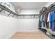 This is a walk-in closet offering multiple racks and shelves to keep you organized in your new home at 22803 67Th E Ave, Bradenton, FL 34211