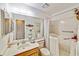 Bathroom featuring a vanity, toilet, and a walk-in bathtub with safety features at 2607 Lancaster Dr # 35, Sun City Center, FL 33573