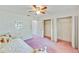 Bedroom features closet with mirrored doors for added storage space at 2607 Lancaster Dr # 35, Sun City Center, FL 33573