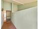 Charming front entrance with textured walls and brick flooring at 2607 Lancaster Dr # 35, Sun City Center, FL 33573