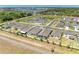 Beautiful aerial view of a single-Gathering home near a pond in a well-planned community at 2926 61St E Dr, Ellenton, FL 34222