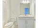 Bathroom with white cabinets and modern fixtures at 2926 61St E Dr, Ellenton, FL 34222