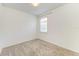 Neutral bedroom showcasing plush carpet and an abundance of natural light at 2926 61St E Dr, Ellenton, FL 34222