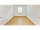 Empty bedroom with hardwood flooring and a window at 2926 61St E Dr, Ellenton, FL 34222