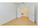 Bedroom with hardwood flooring and an open doorway at 2926 61St E Dr, Ellenton, FL 34222