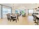 Bright living area featuring dining area, modern furnishings, recessed lights, and natural light at 2926 61St E Dr, Ellenton, FL 34222