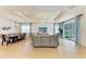 Bright and open living space featuring a dining area and sliding glass doors to the outdoor patio at 2926 61St E Dr, Ellenton, FL 34222