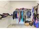 Walk-in closet providing ample storage space for clothing and accessories at 2926 61St E Dr, Ellenton, FL 34222