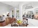Cozy breakfast nook with a view into the living room, a trey ceiling, and ample natural light at 315 Heritage Isles Way, Bradenton, FL 34212