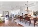 Elegant dining room with tray ceilings, chandelier lighting, and an open floor plan at 315 Heritage Isles Way, Bradenton, FL 34212