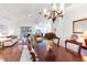 Elegant dining area with pendant lighting and an open-concept living space at 315 Heritage Isles Way, Bradenton, FL 34212