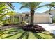 Charming single-story home with well-manicured landscaping and a two-car garage at 315 Heritage Isles Way, Bradenton, FL 34212